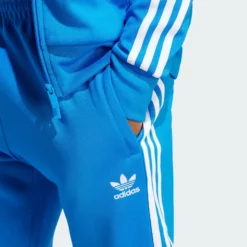 Синие брюки Adidas - Спортивные брюки Adicolor Classics SST