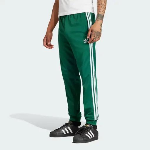 Зеленые брюки adidas - Спортивные брюки Adicolor Classics SST